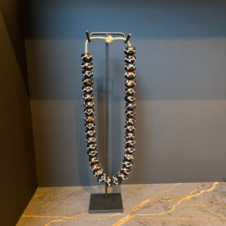 necklace-on-stand-black-tiger-tjkinterior